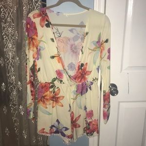 Flowered medium short Romper.